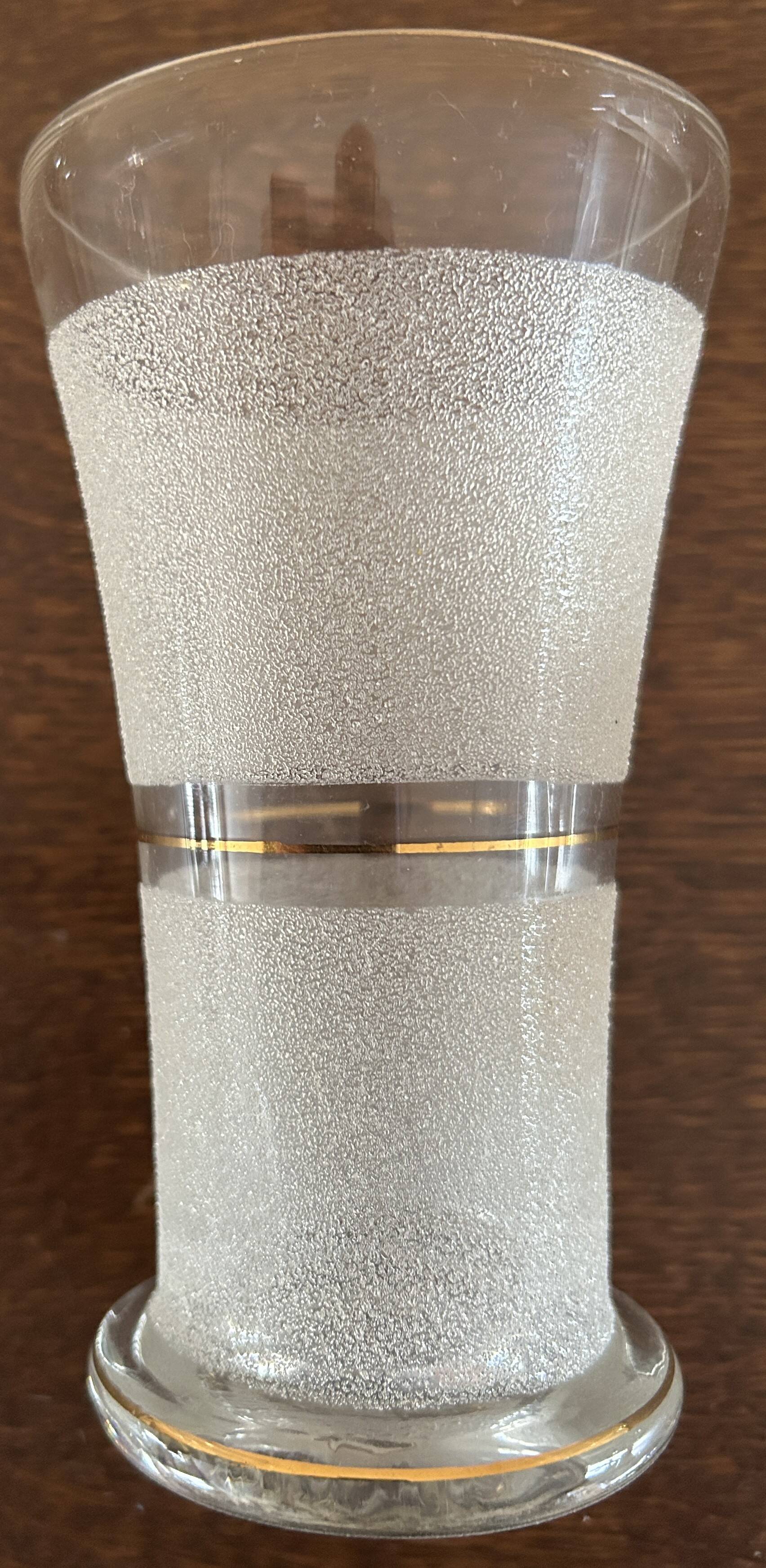 Jug + 6 frosted glass tumblers with white and gold rim.