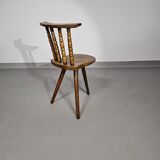 Old farmers tripod chair for decorative use