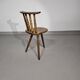 Chaise tripode ancienne de fermier à usage décoratif