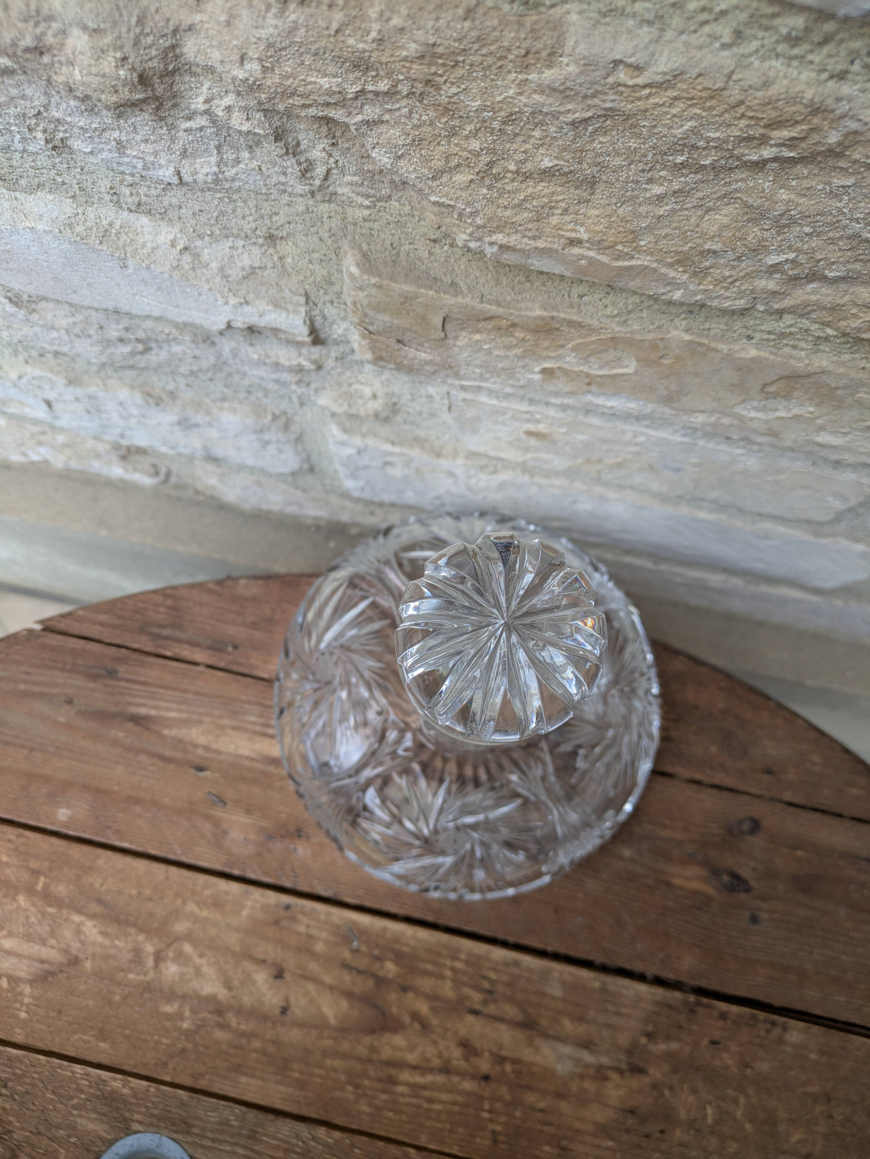Antique cut crystal decanter with stopper.