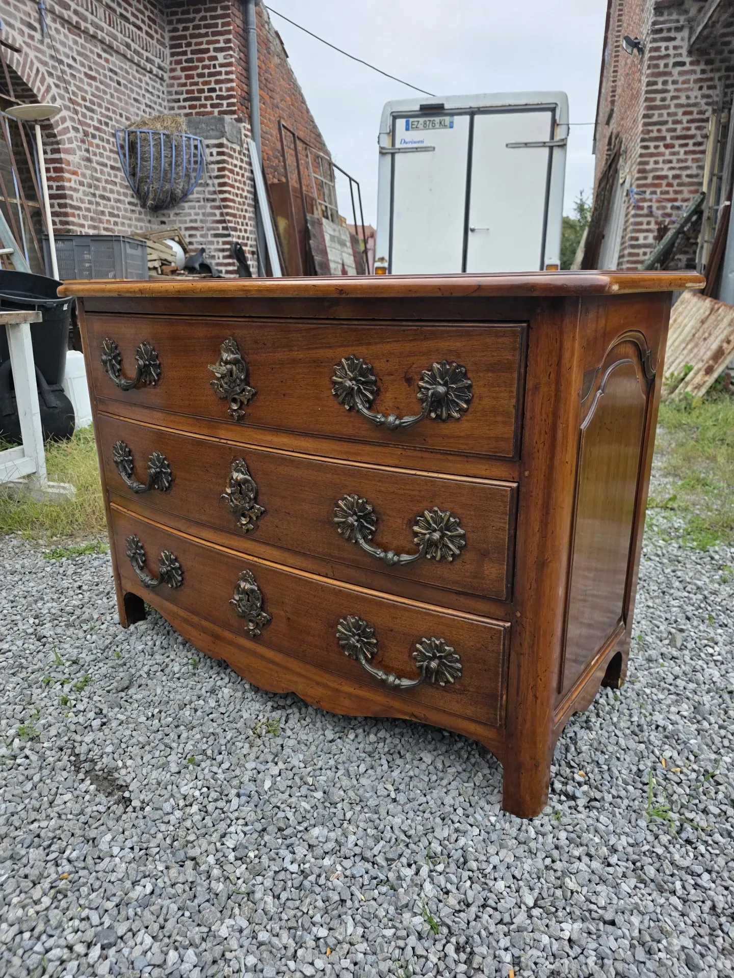 Curved Louis XV style chest of drawers in solid walnut