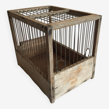 Old bird cage in wood and steel