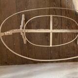 Old wrought iron cradle painted