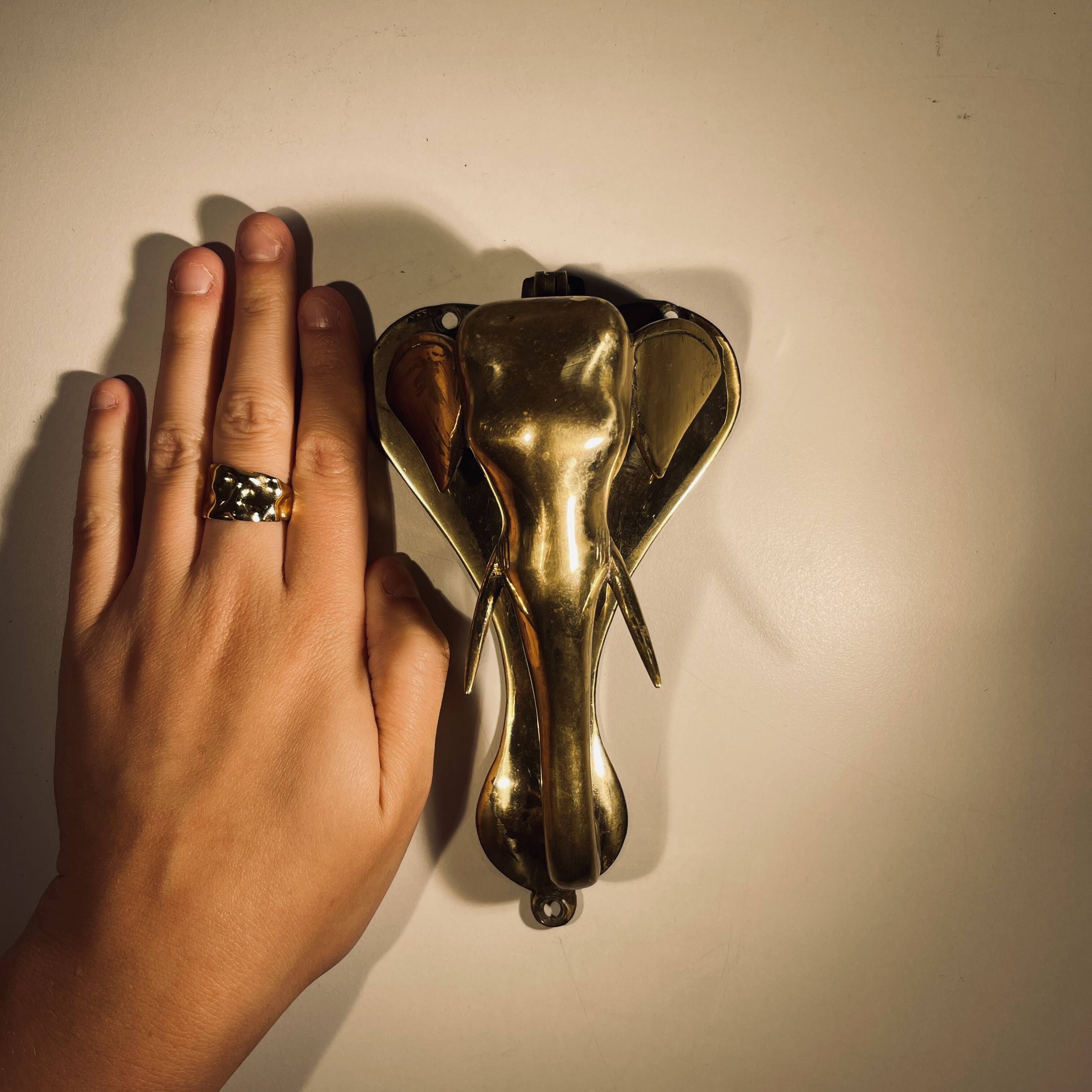 Door knocker / wall paperweight, bronze elephant sculpture