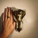 Door knocker / wall paperweight, bronze elephant sculpture
