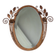 Art Deco mirror from the 1930s in hammered steel.