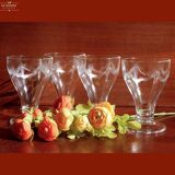 4 large water glasses or Evian ice cream cups