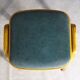 Two MID-Century green vinyl stools from the 1970s with tapered legs.