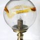 Table lamp in solid brass with a vintage 1970s glass globe.