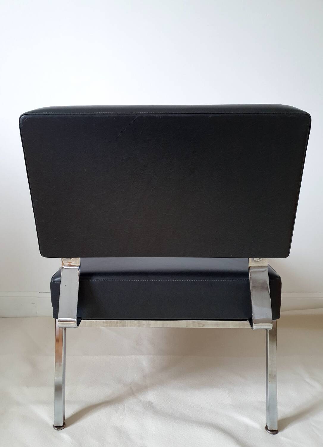 Chrome metal and imitation leather armchair from the 50s
