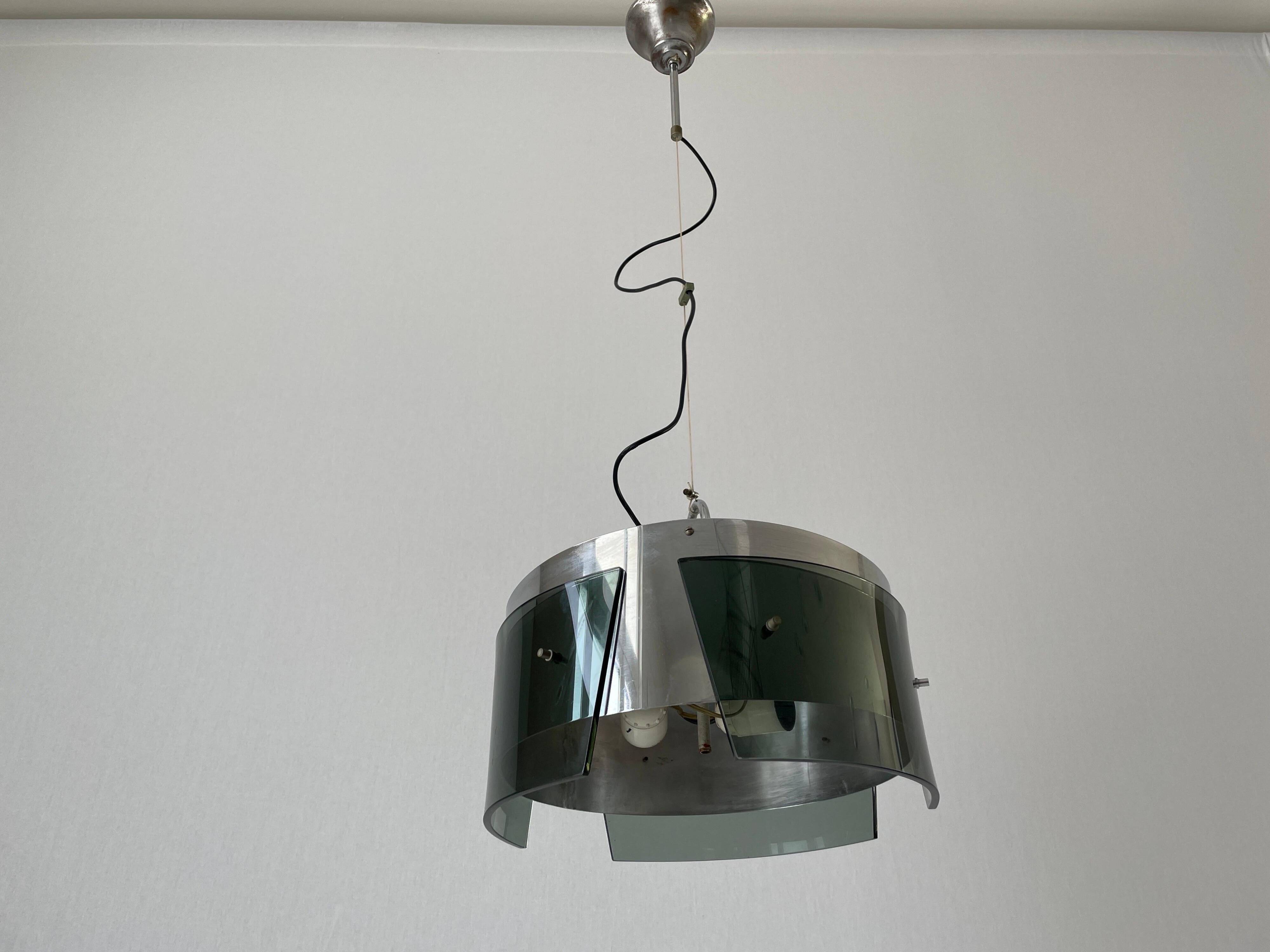 Suspended lamp in green glass and chrome, 1960s, Italy