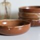 Set of 4 plates in sandstone of Saint Amand signed