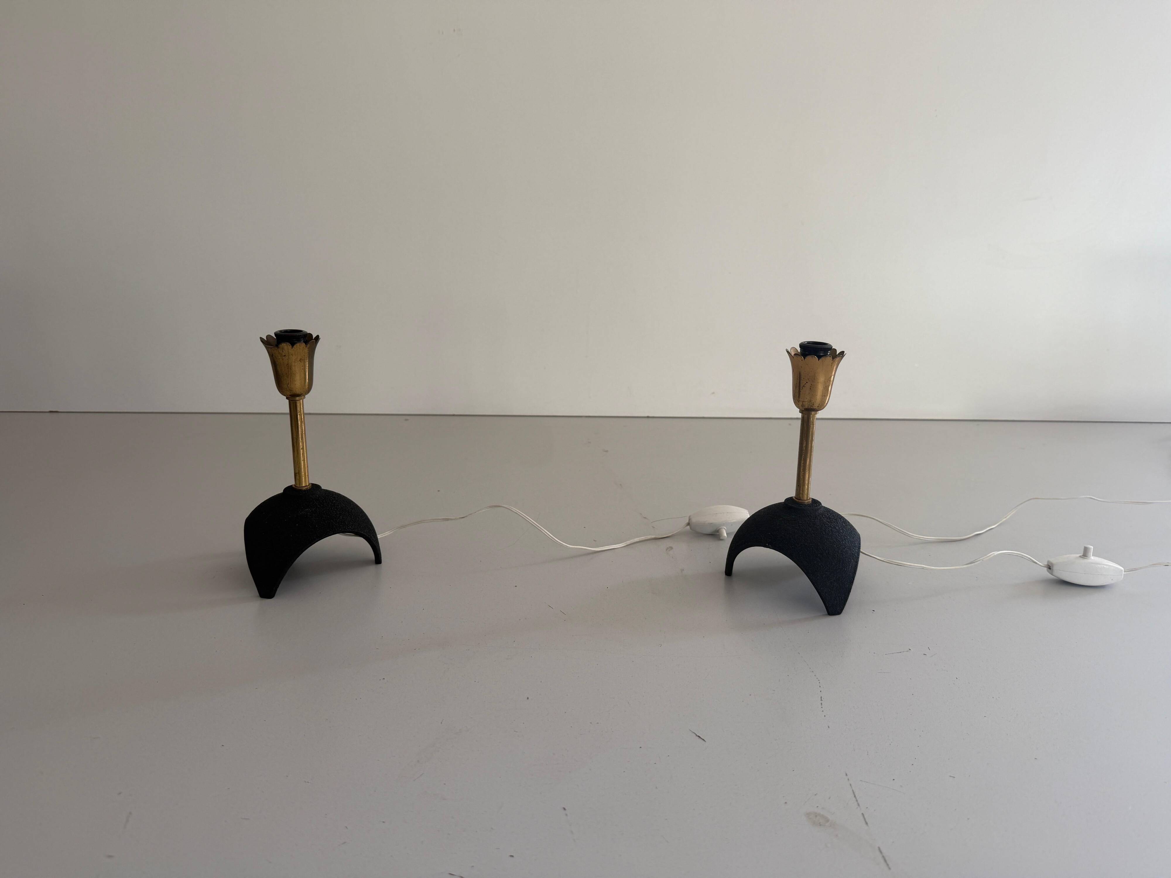 Pair of mid-century bedside lamps in brass and black metal, 1960, Italy