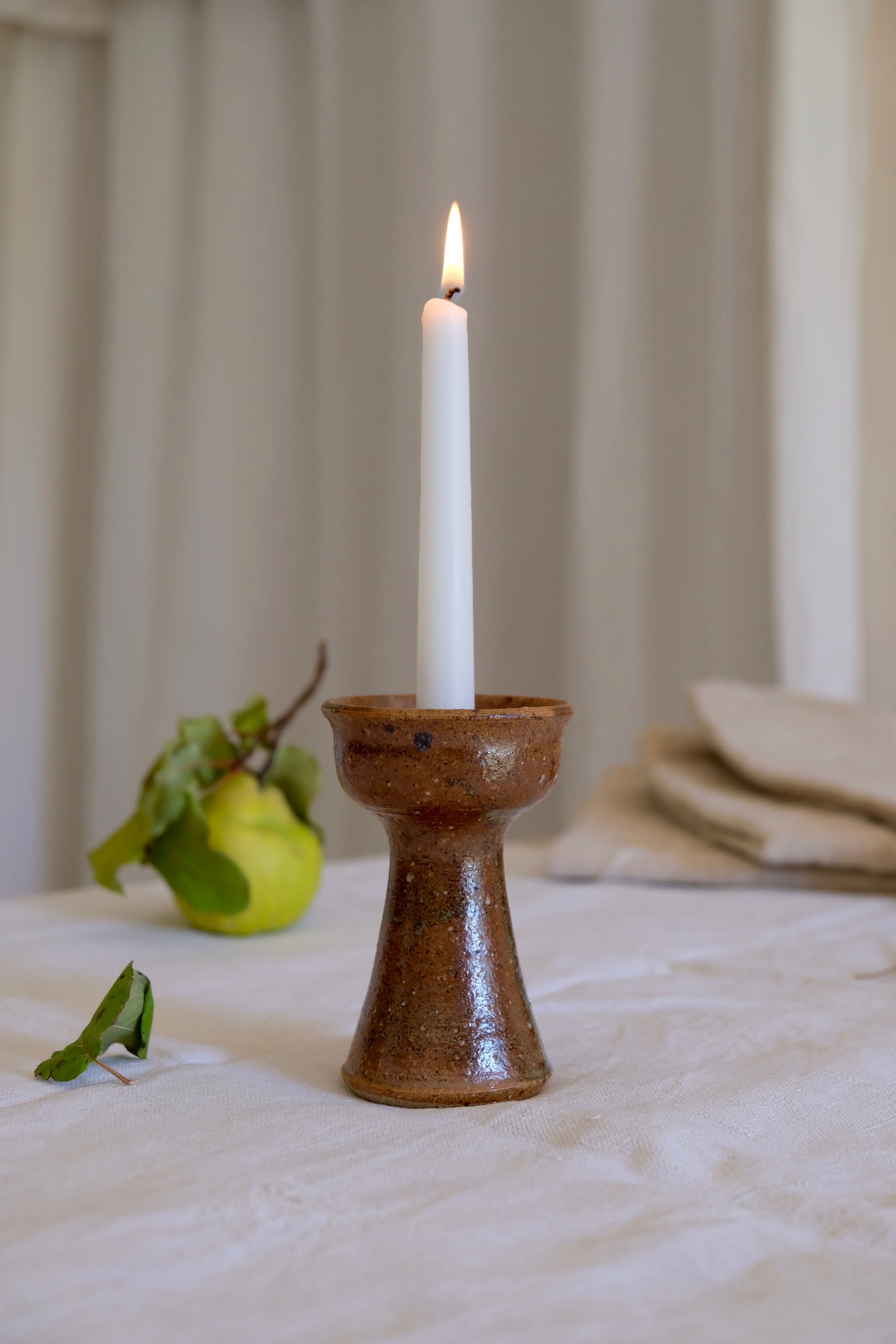 Old sandstone candle holder