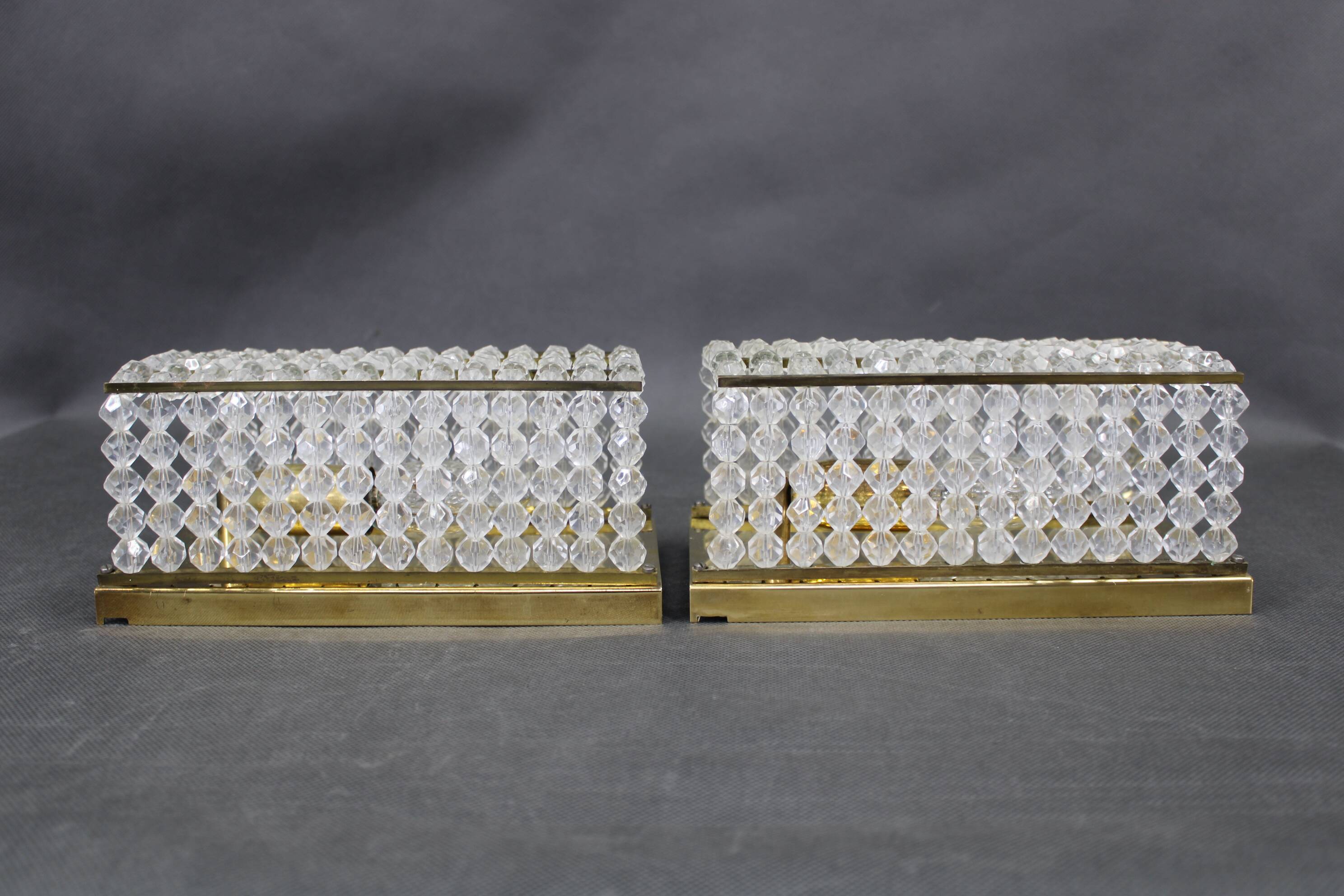 Pair of Austrian mid-century brass and acrylic wall lights, 1970s