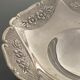 1 silver metal cup or pocket tray
