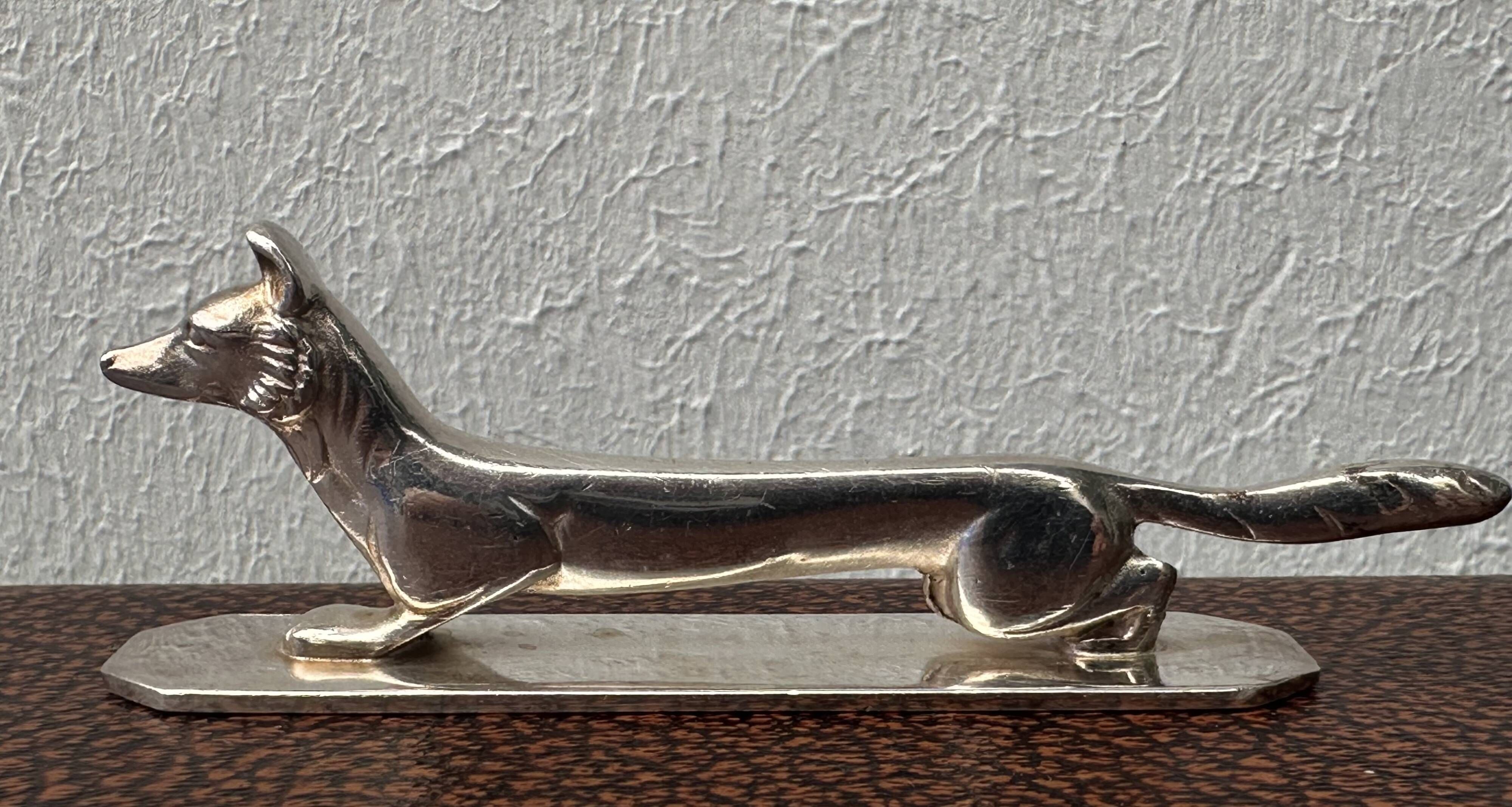 12 antique silver-plated bronze knife rests in modern art deco animal designs.