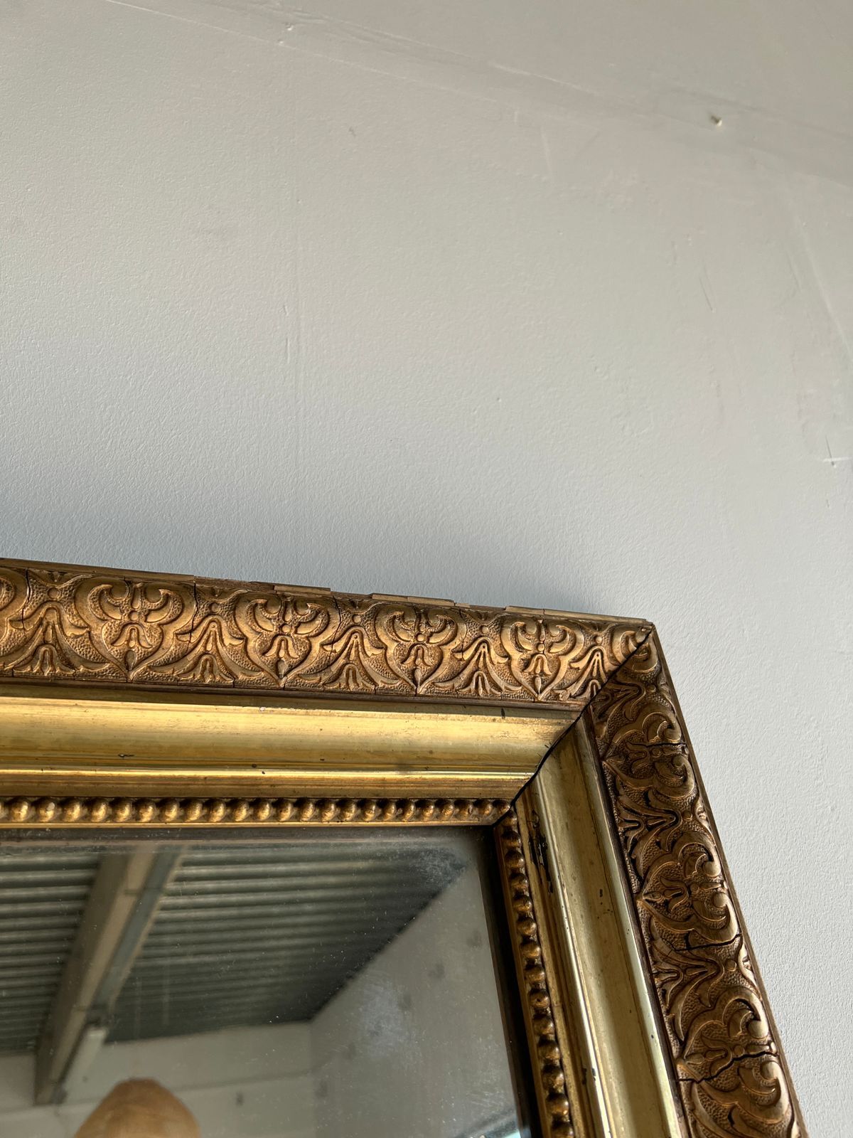Gilded mirror with frieze h2m10 l:73cm