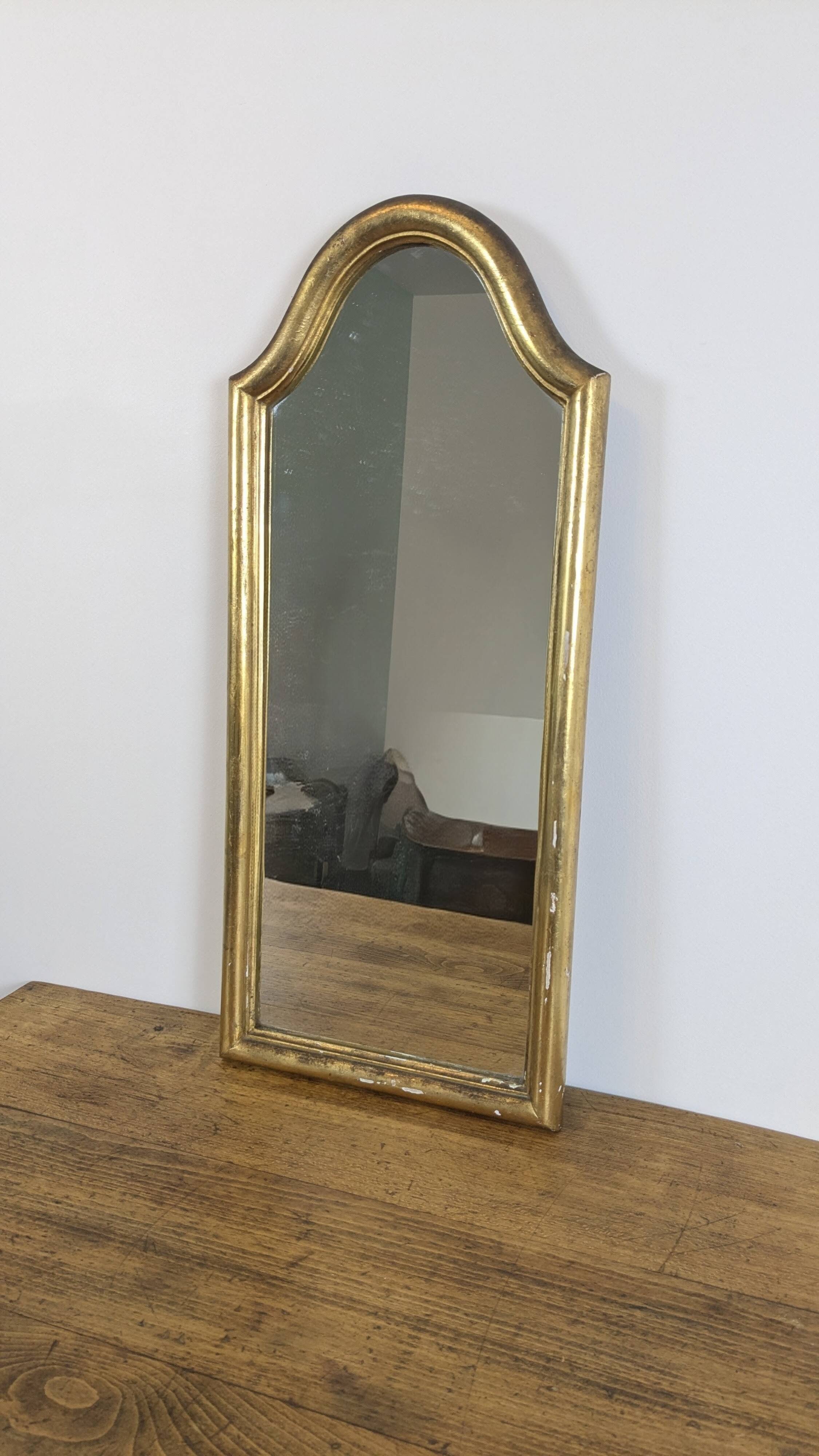 Antique gold mirror known as "gendarme's hat", patinated elegance 70 x 30 cm