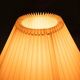 Vintage table lamp in woven ceramic Regency style.