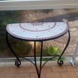 Ceramic half-moon table and wrought iron