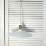 Hanging in opaque white glass.