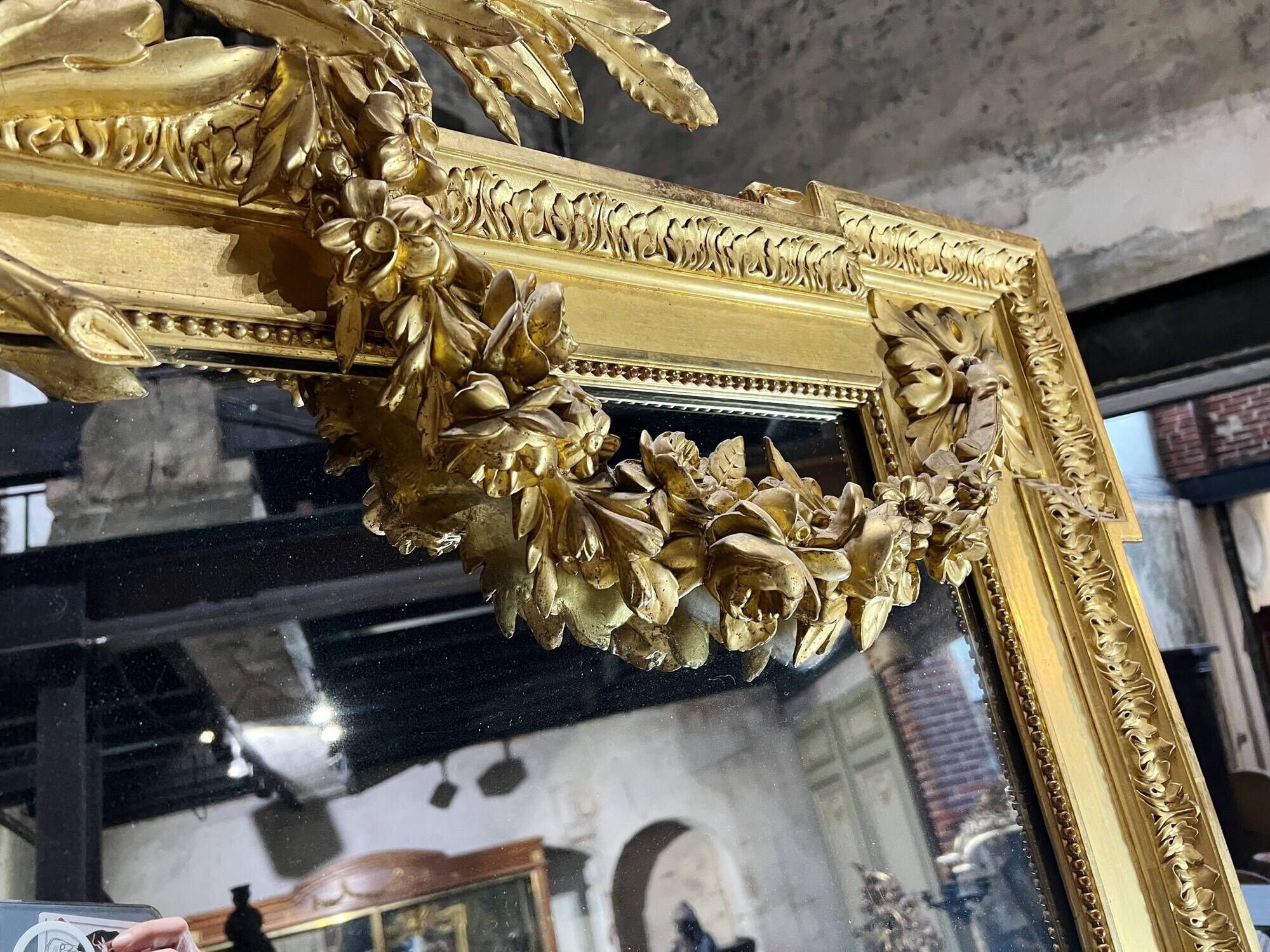 Monumental mirror Napoleon III in gilded wood with the profile of Apollo