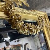 Monumental mirror Napoleon III in gilded wood with the profile of Apollo