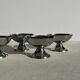 Set of 4 vintage metal ice cream glasses/cups on a stand.