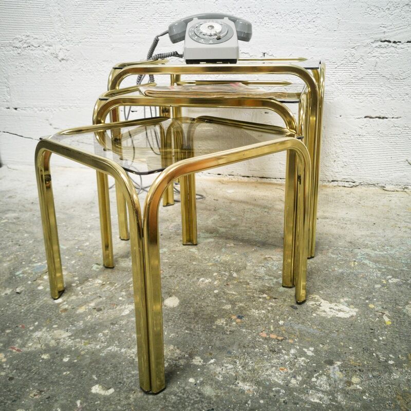 Trio of gilded metal trundle tables