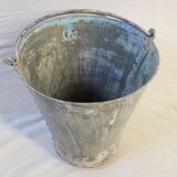 Old bucket with thick zinc handle