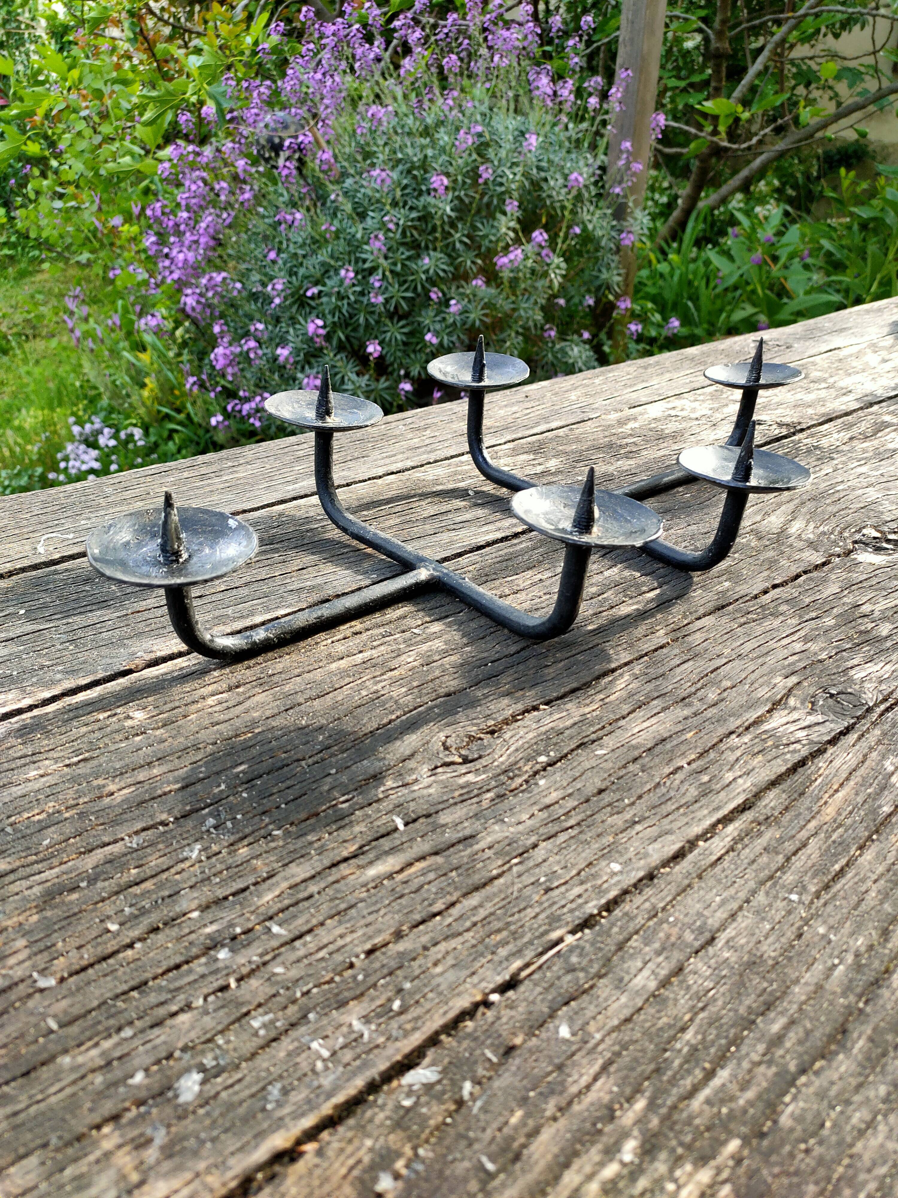 Brutalist cast iron candle holders.