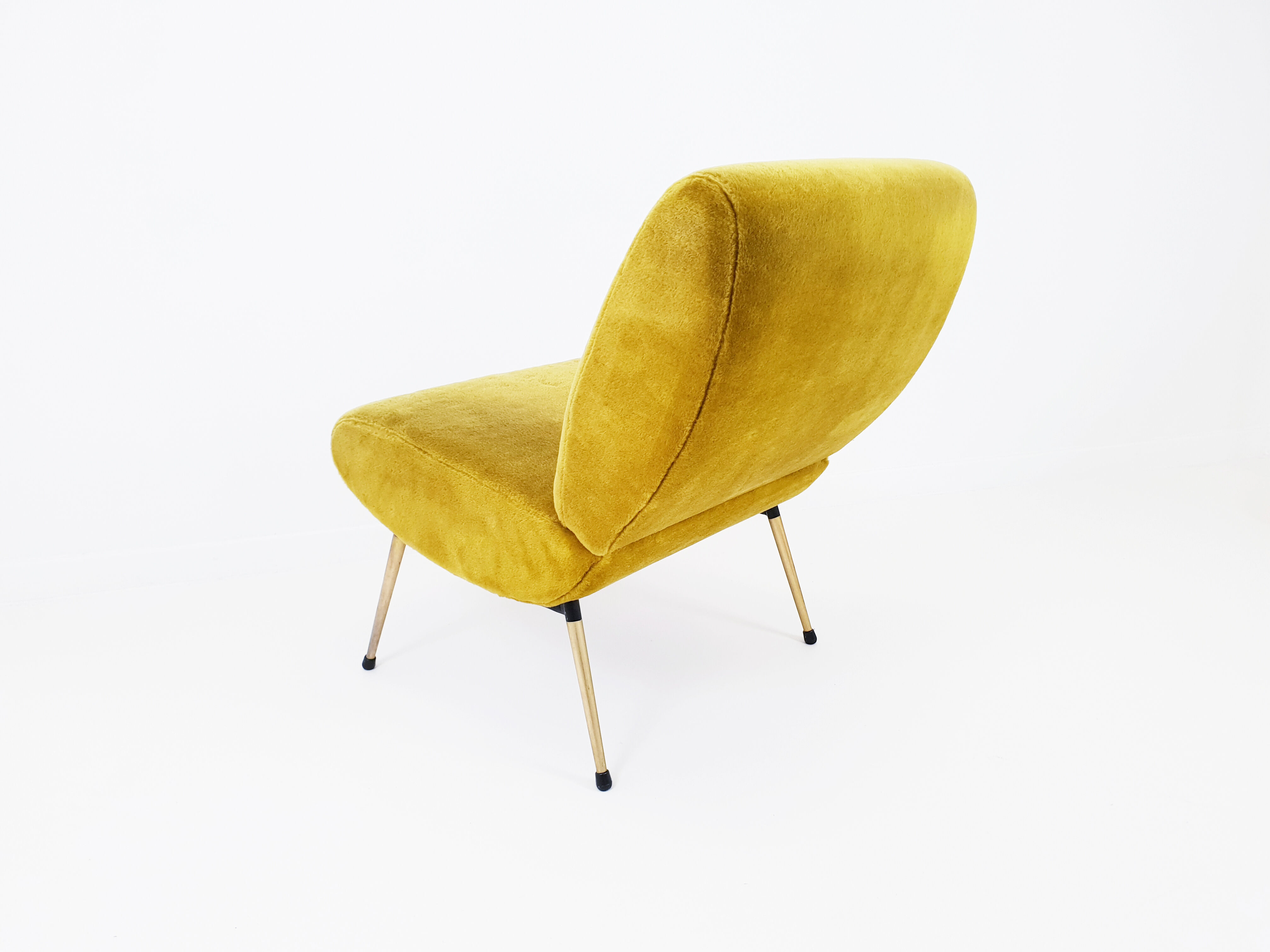 Mustard armchair by Pelfran