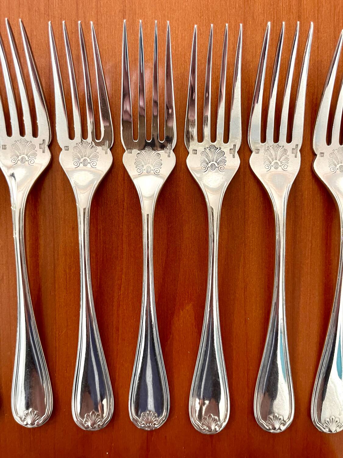 Christofle Marot Berain, 12 fish cutlery sets, shell decor