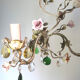 Painted metal chandelier and porcelain flowers