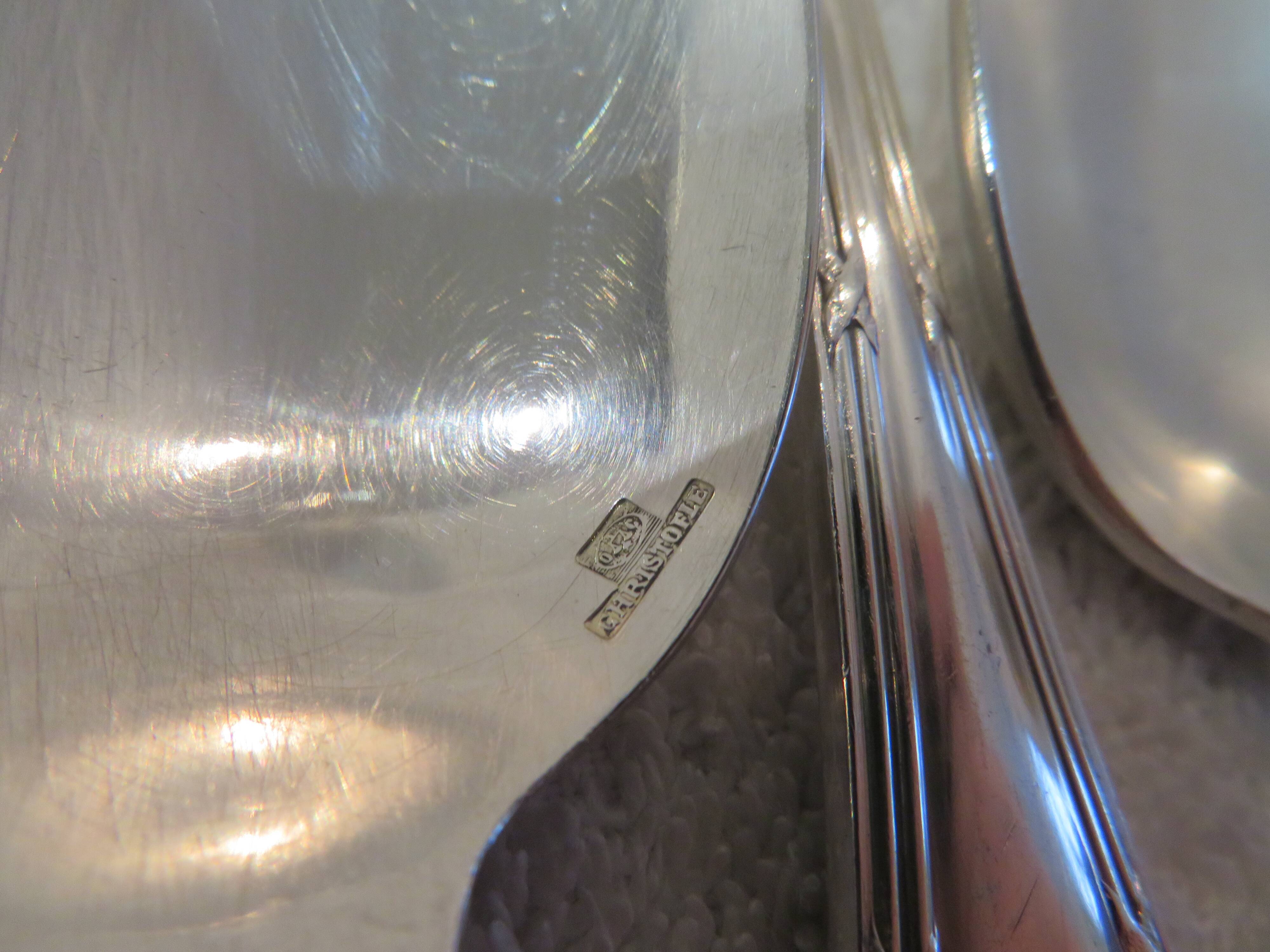 12 silver plated soup spoons by Christofle with Louis XVI ribbons