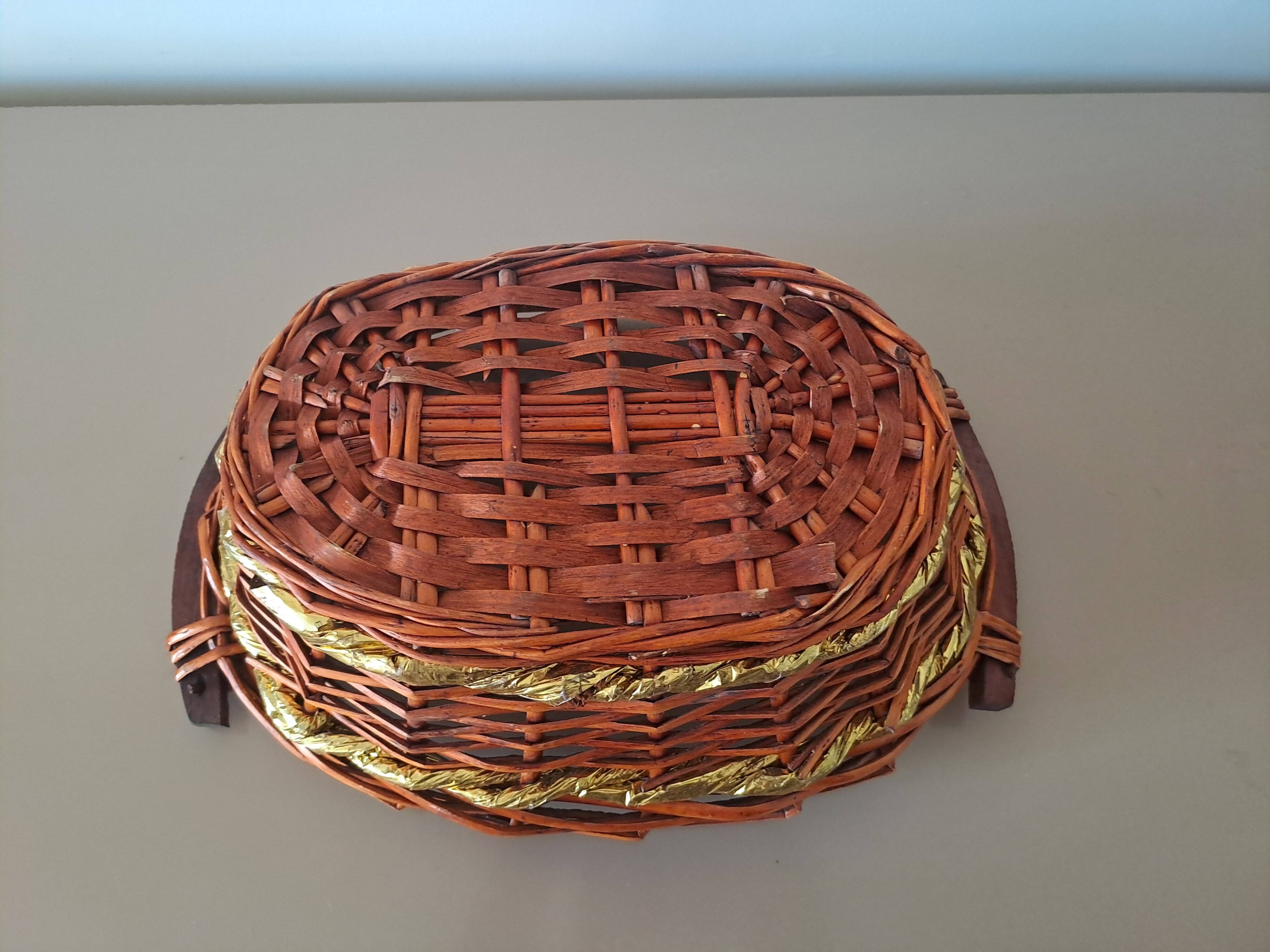 Vintage round woven wicker basket with wooden handles