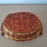 Vintage round woven wicker basket with wooden handles