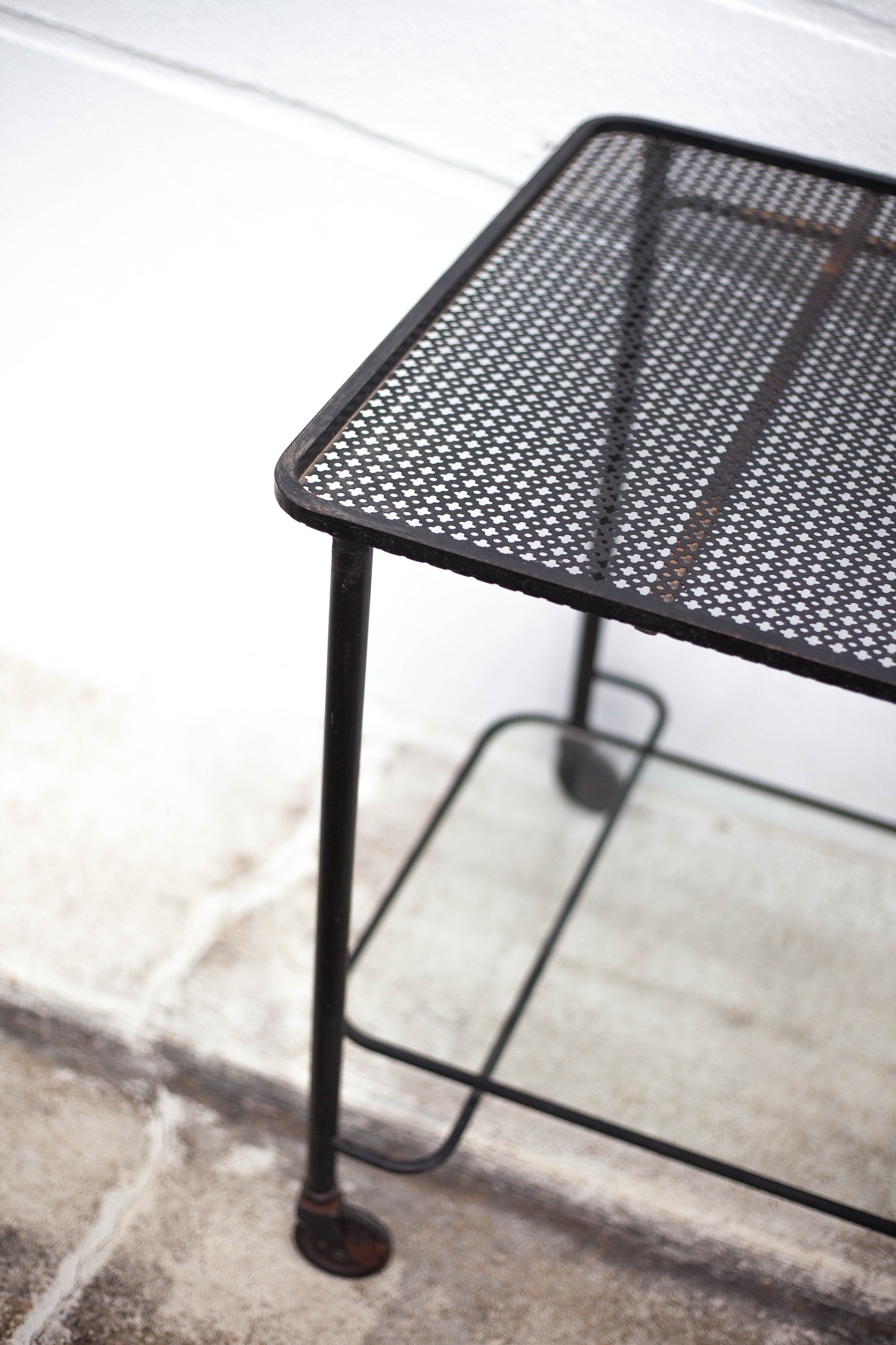 Mathieu Matégot rolling table, steel and brass service, 50s