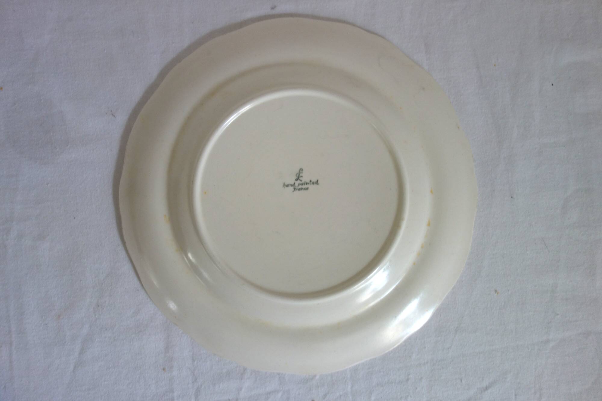 12 old Longchamp flat plates with floral decoration