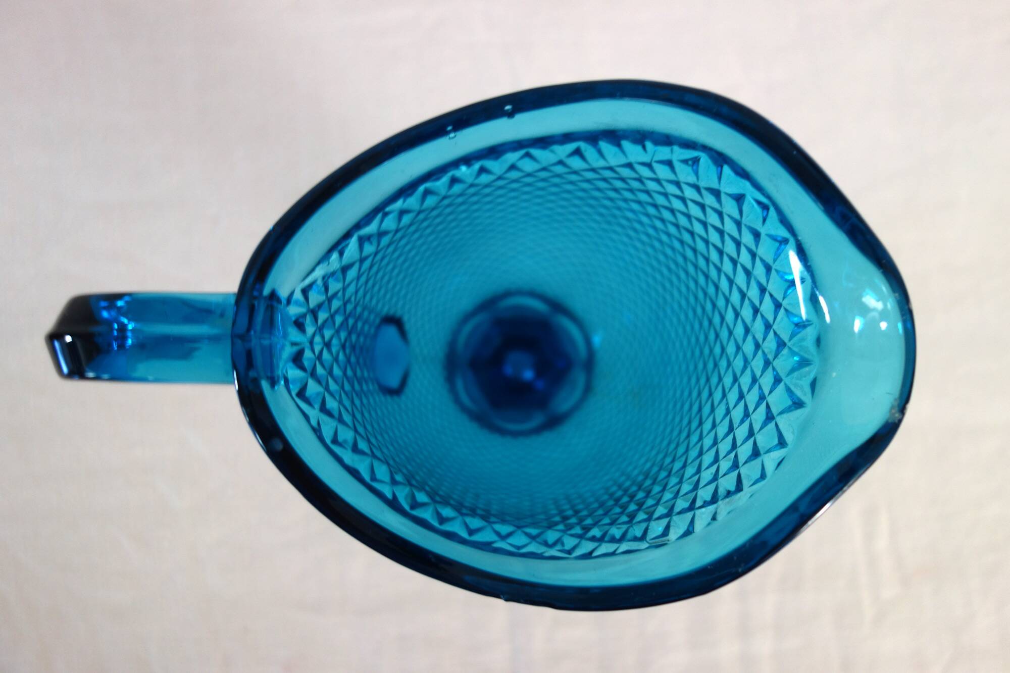 Vintage cut glass blue pitcher