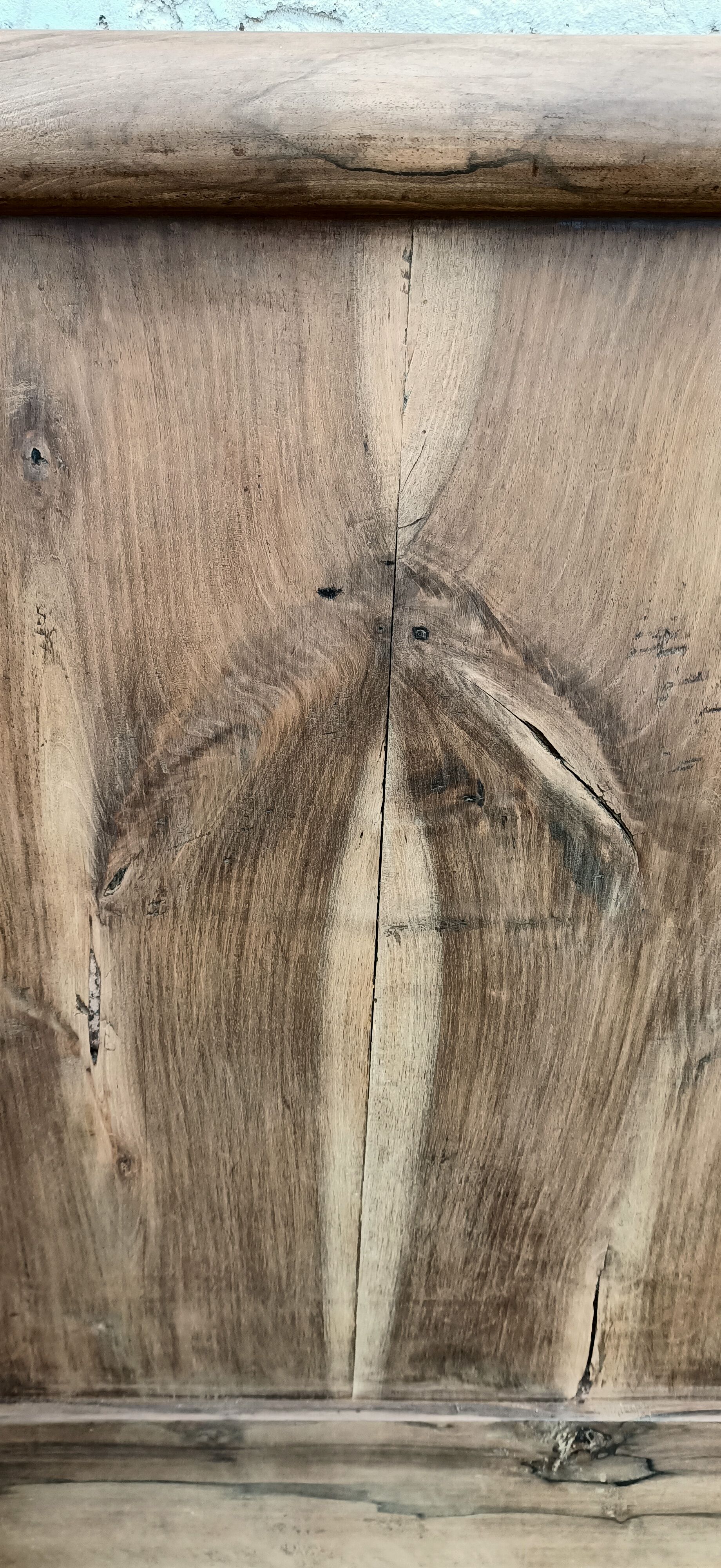 Old bed made of raw wood