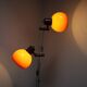 Vintage Hungarian adjustable floor lamp with two orange globe shades, circa 1970.