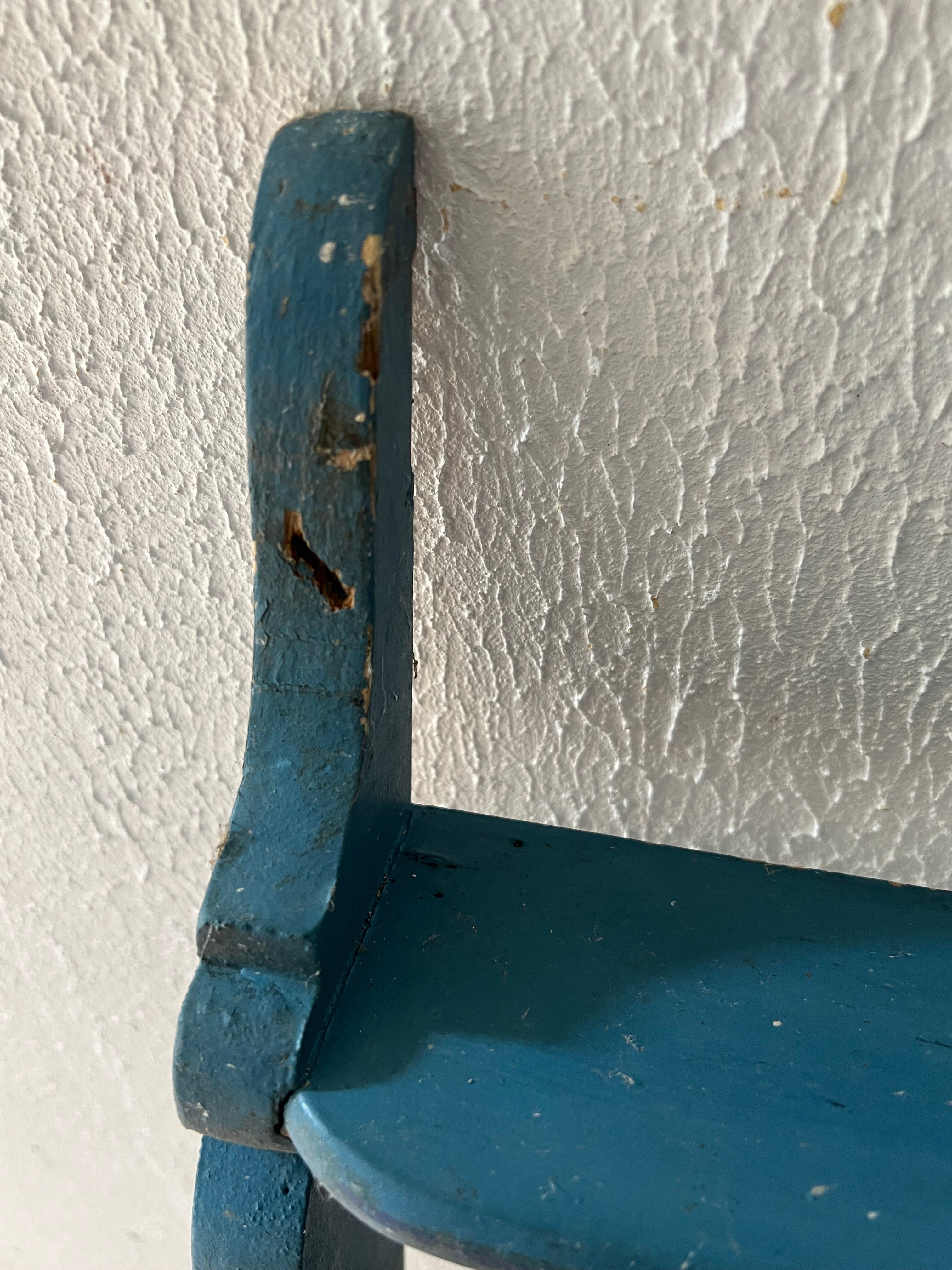 Blue wooden wall shelf