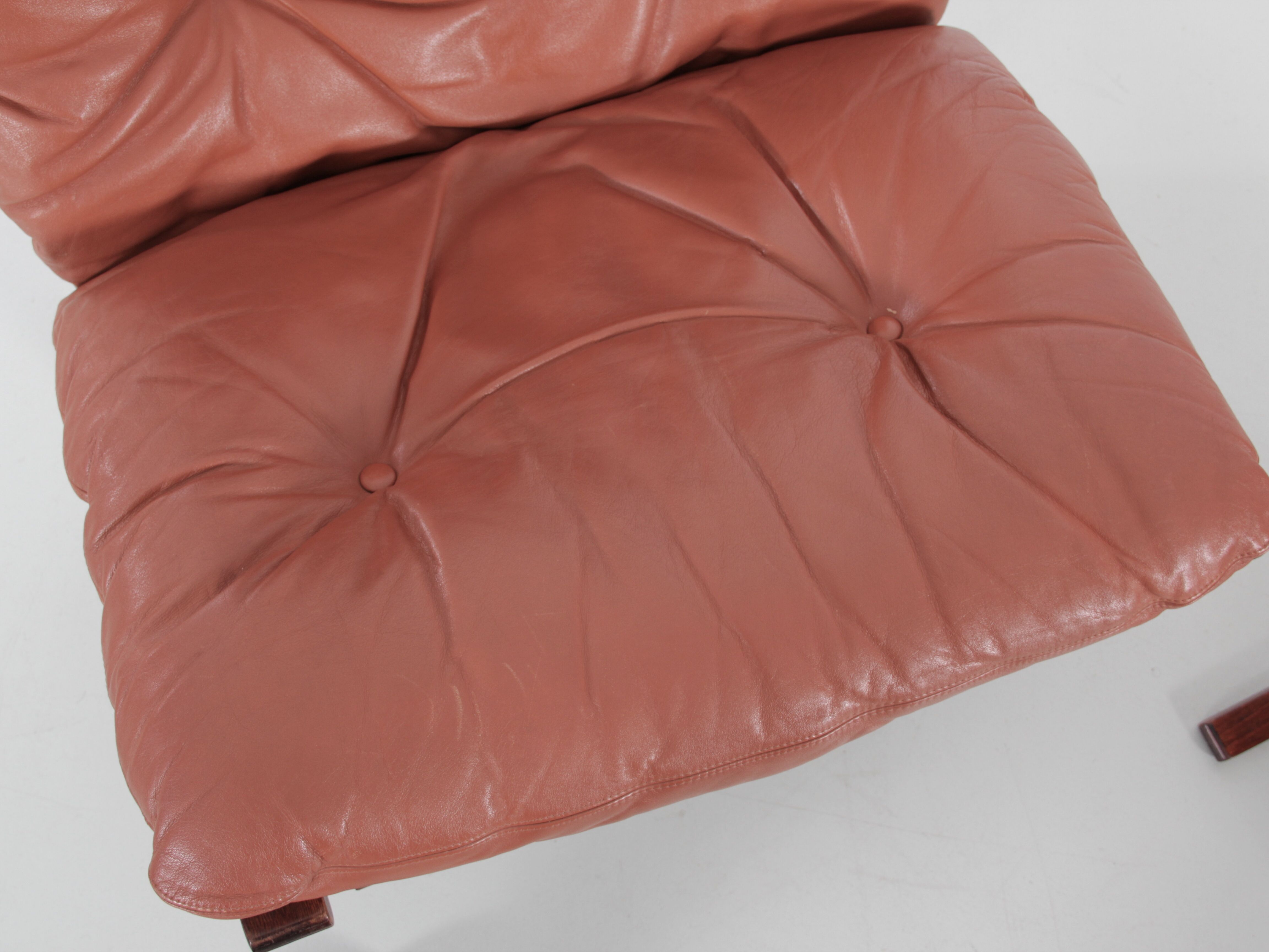 Scandinavian chair model Siesta, high back and foot rests