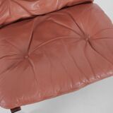 Scandinavian chair model Siesta, high back and foot rests