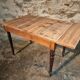 Vintage French pine table with extendable side, circa 1930, suitable for kitchen or office use.