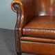 Leather club chair with black piping