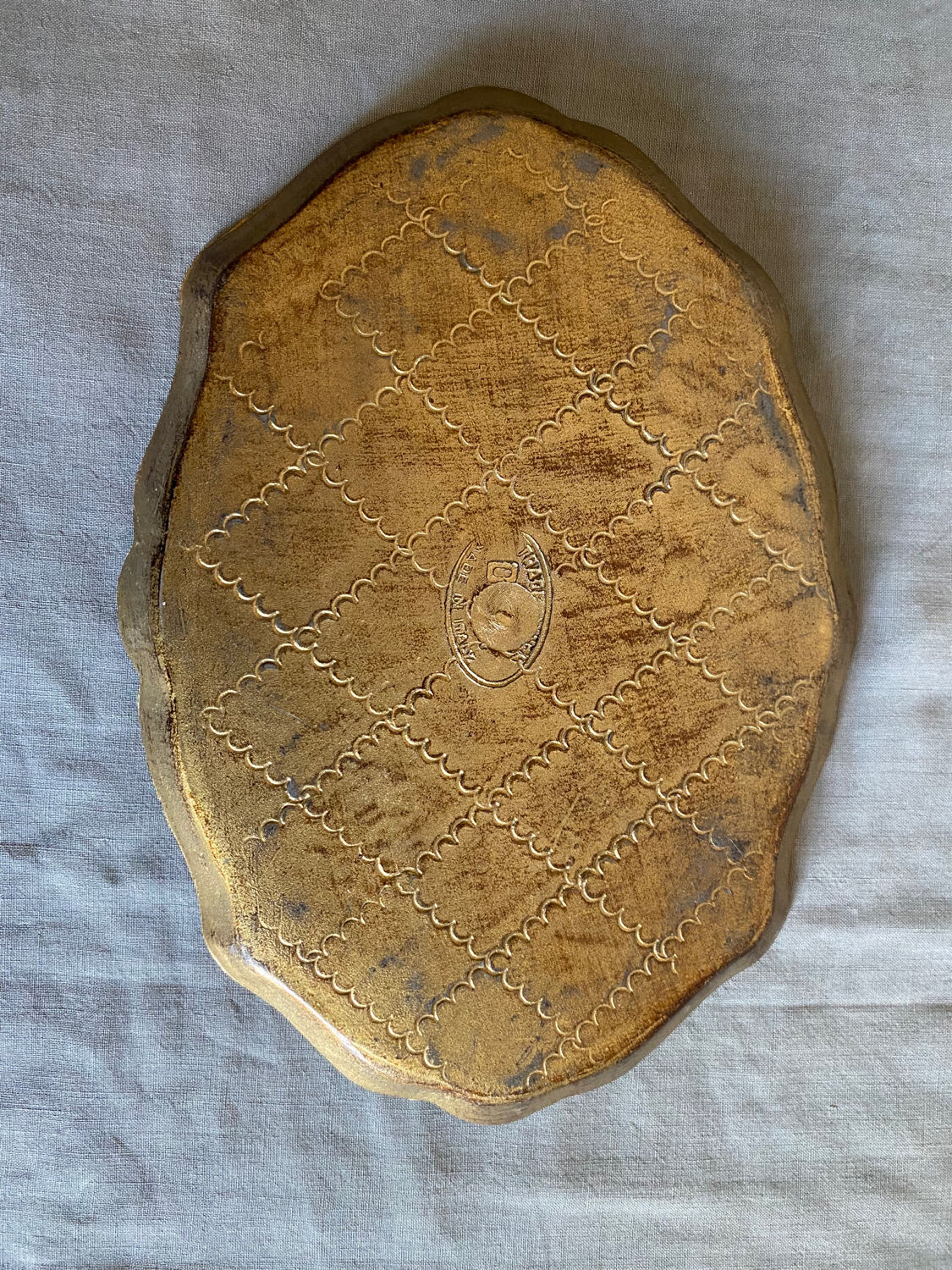 Venetian tray in orange and gold wood