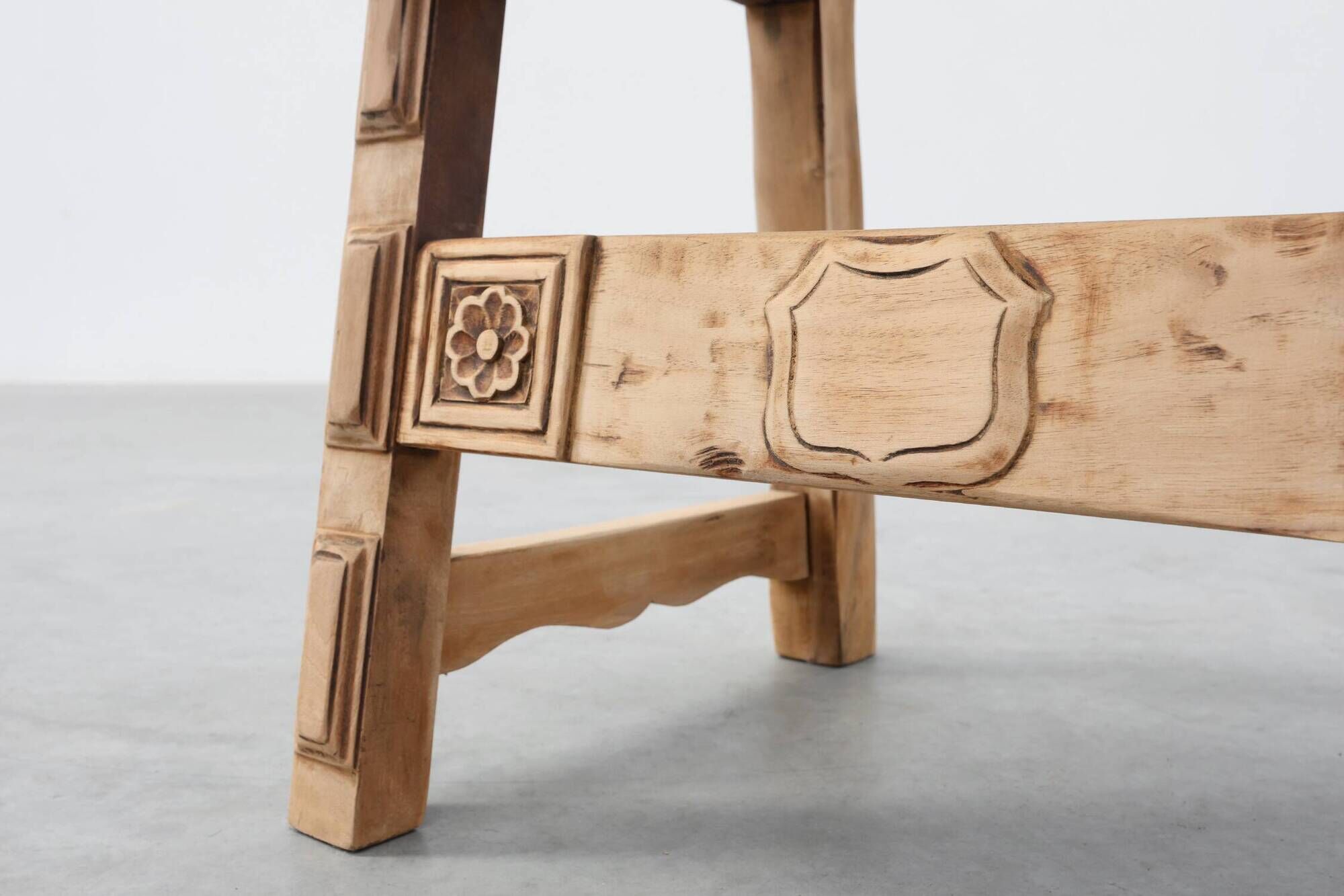 Brutalist armchair with carved rosettes and nailed wooden seat, Spain, 20th